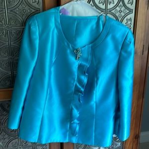 Formalwear's women's suit; beautiful turquoise color. Perfect for a wedding.